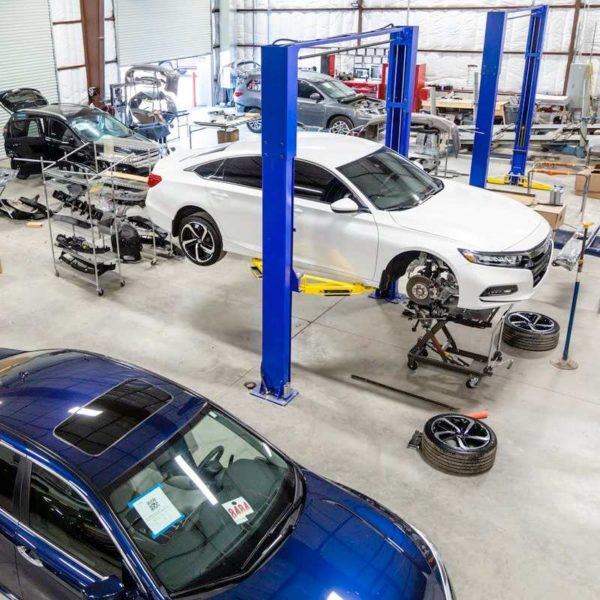 unlimited collision cars on rack auto body repair glendale cars on lifts